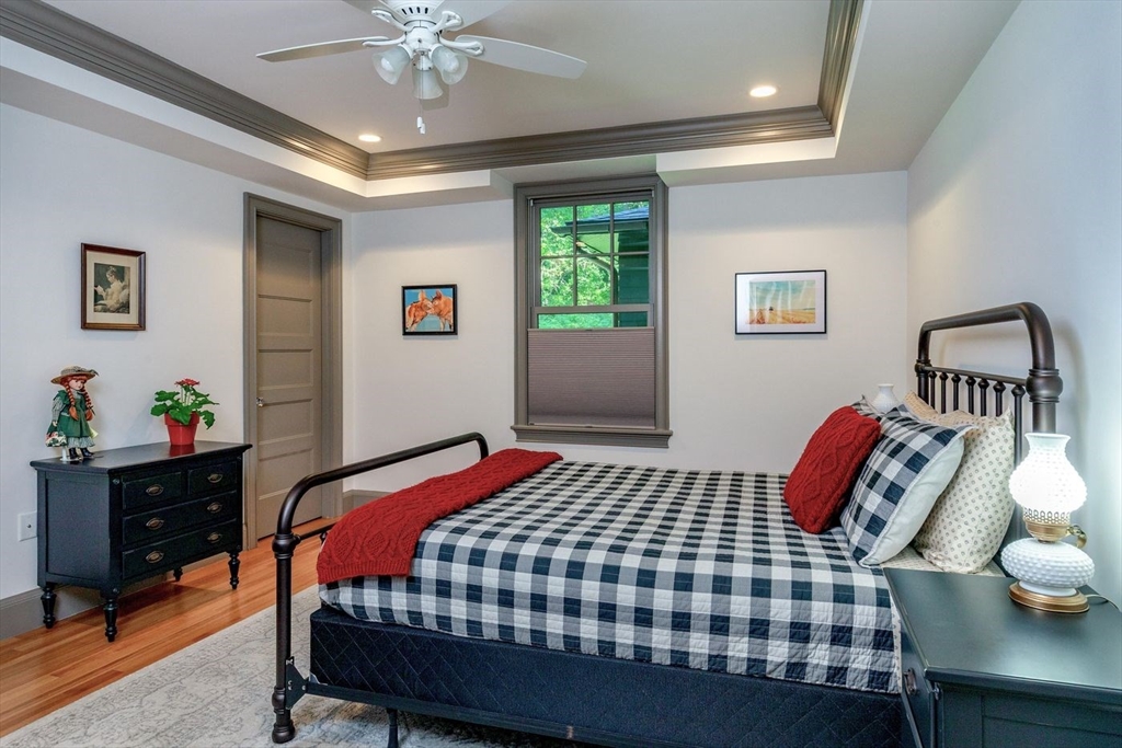 450 Summer Street Manchester, MA 01944 - Photo 23 of 42 a bedroom with a bed and a window