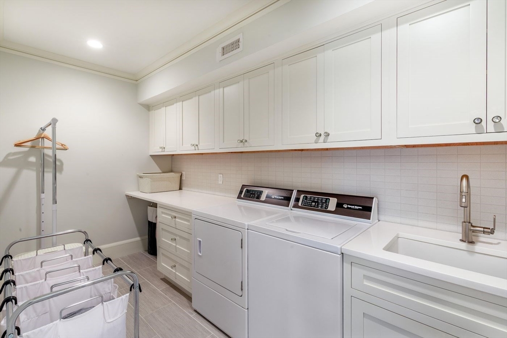 450 Summer Street Manchester, MA 01944 - Photo 27 of 42 a room with storage and utility