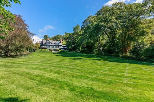 a backyard of a house with lots of green space