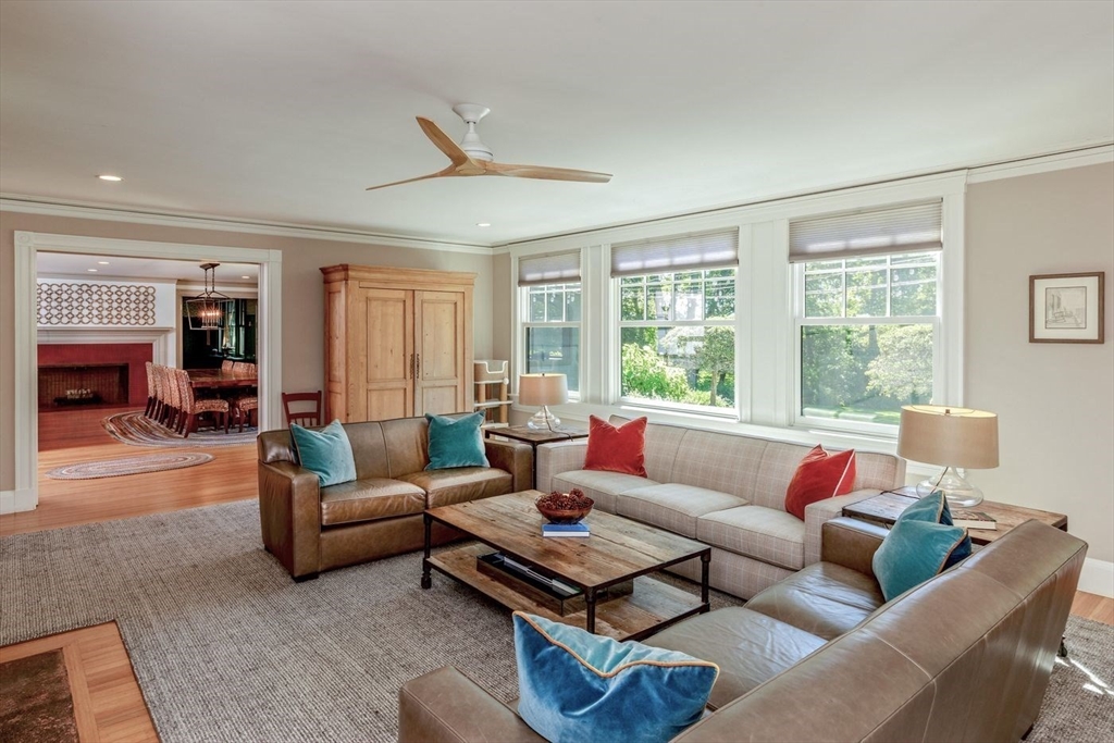 450 Summer Street Manchester, MA 01944 - Photo 9 of 42 a living room with furniture and a large window