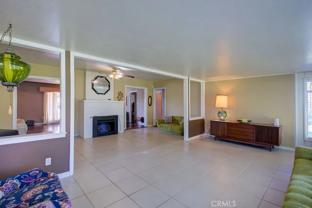 a view of a livingroom with furniture and a fireplace