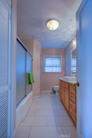 a bathroom with a sink a vanity and mirror