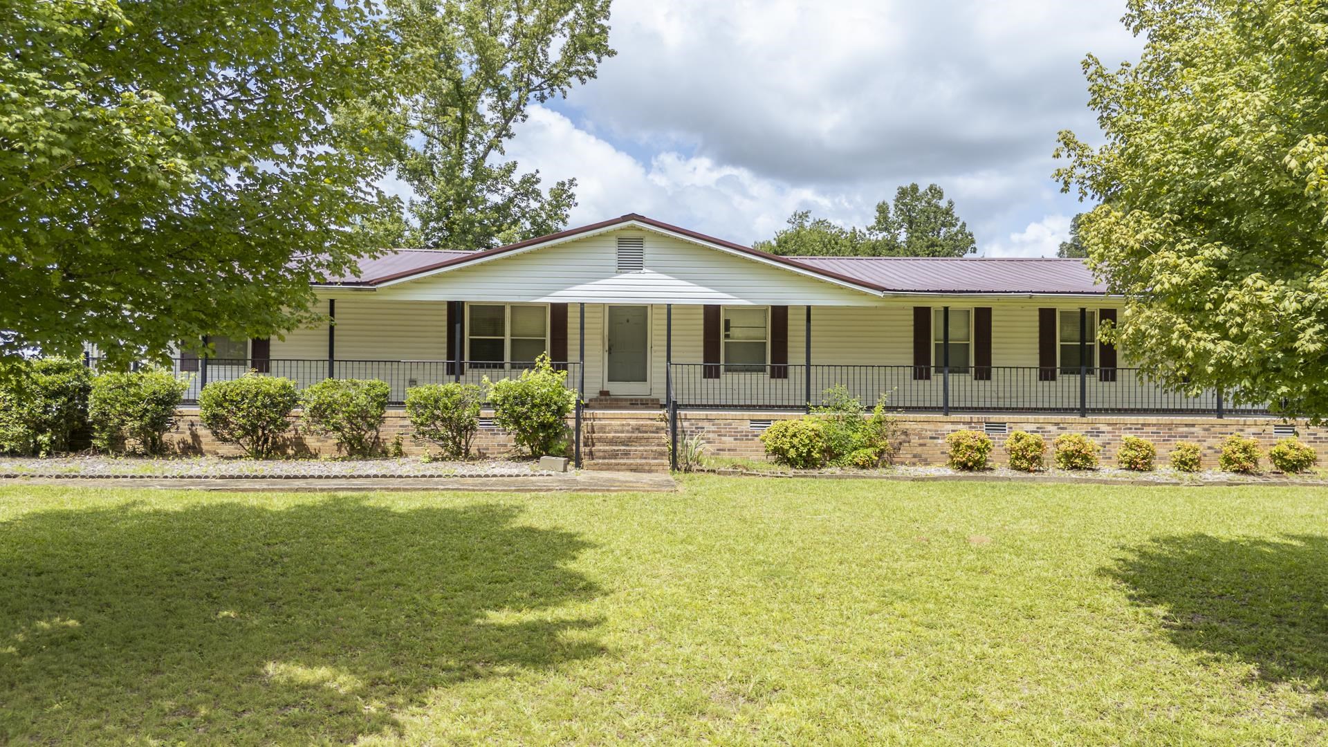 859 Old Morris Chapel Road Adamsville, TN 38310 - Photo 35 of 39 Single-story residence featuring a broad front lawn
