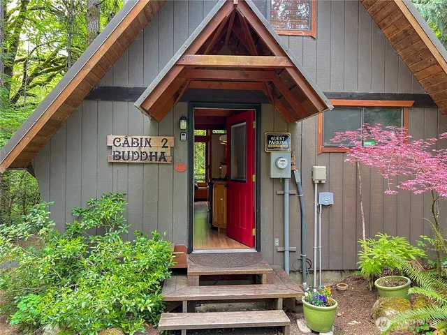 a house view with a garden space