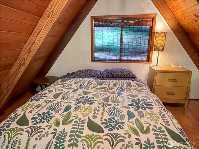 a room with furniture rug and wooden floor