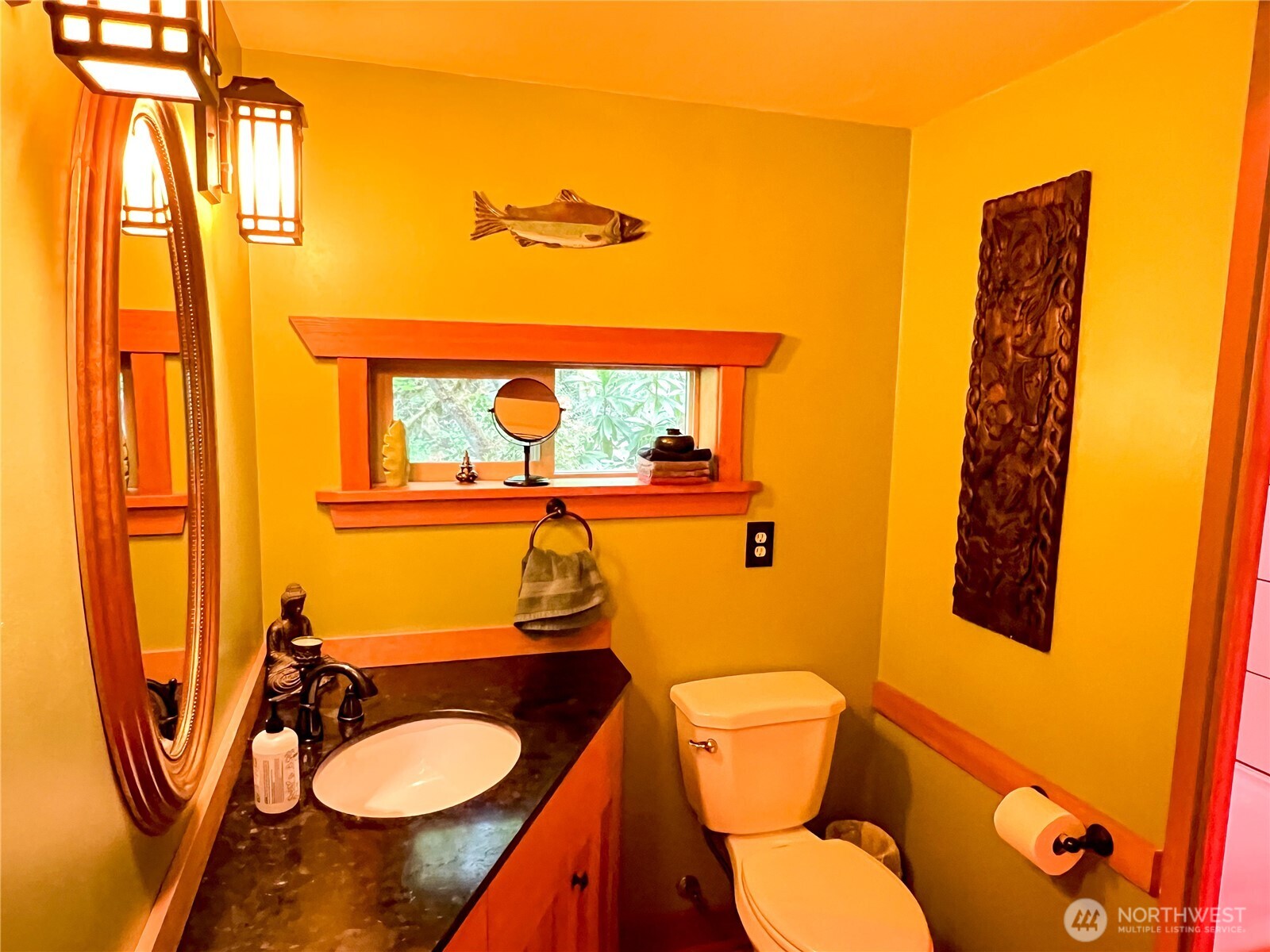 423 Lords Lake Loop Road Quilcene, WA 98376 - Photo 24 of 40 a bathroom with a toilet sink and mirror