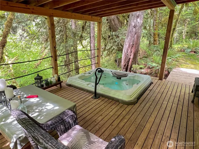 a sign that is sitting in front of a brick building