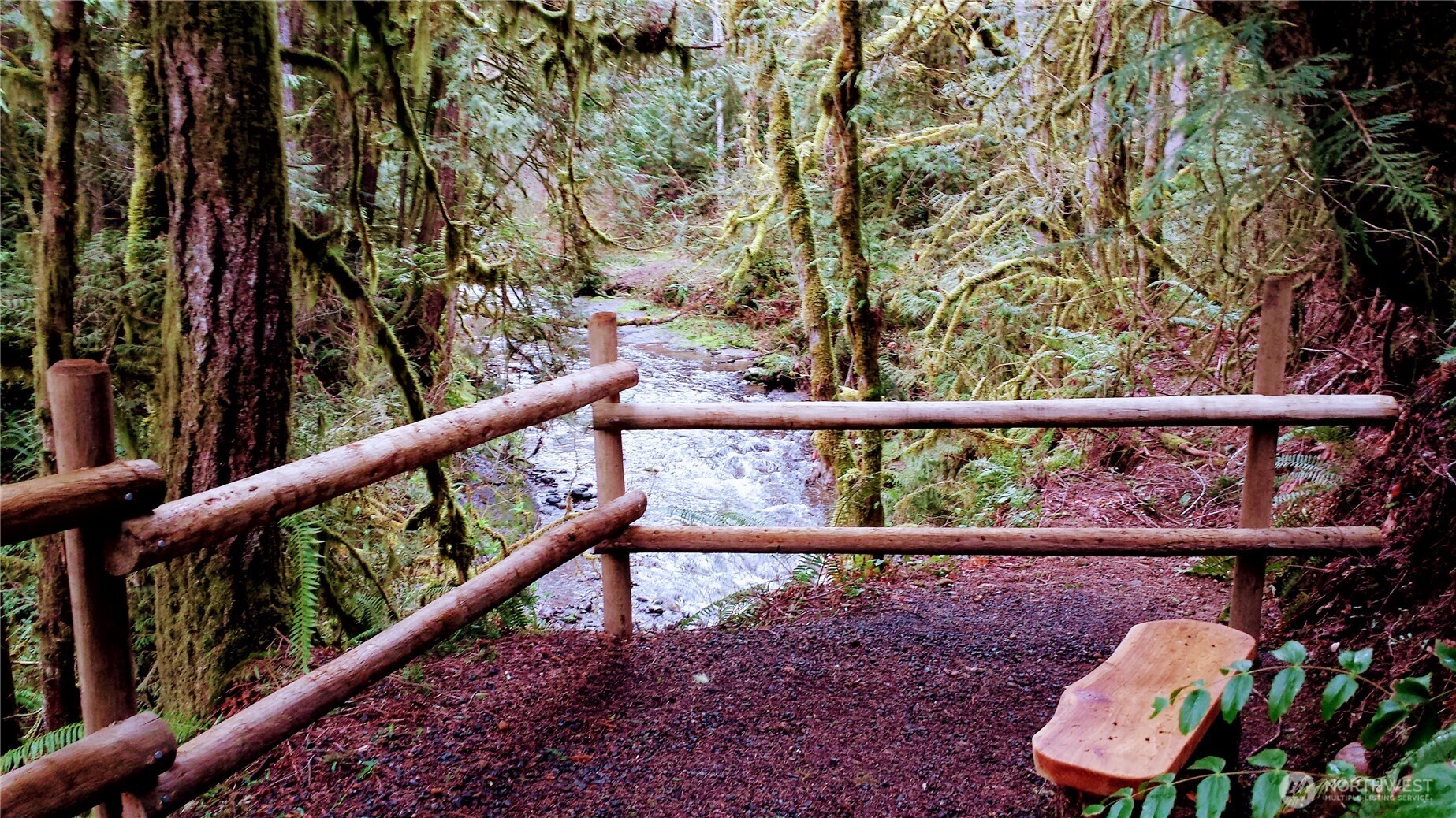423 Lords Lake Loop Road Quilcene, WA 98376 - Photo 34 of 40 a view of a chair and table in the balcony