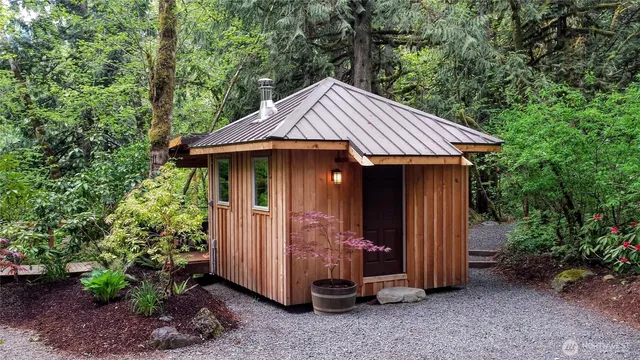 a view of a house with a street