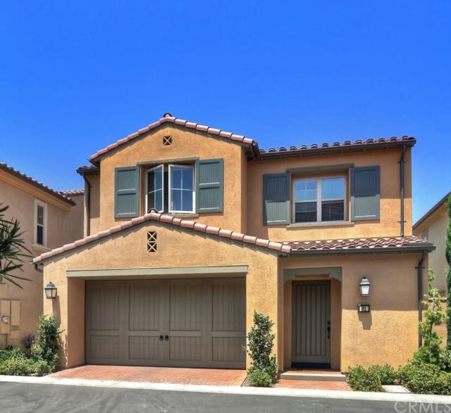 91 Coleridge Irvine, CA 92620 - Photo 1 of 1 a front view of a house with garage