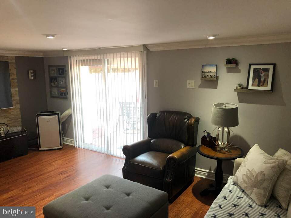 10906 East Keswick Road Philadelphia, PA 19154 - Photo 22 of 33 Entertainment Room with access to rear yard