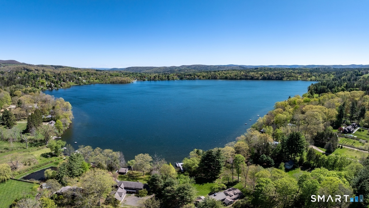 165 Interlaken Road Salisbury, CT 06039 - Photo 29 of 31 a view of a lake with houses in the back