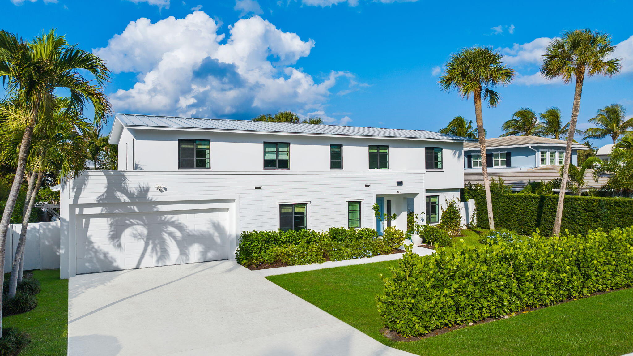 226 Cove Place Jupiter Inlet Colony, FL 33469 - Photo 2 of 66 4-web-or-mls-DJI_20231203144233_0600_D (