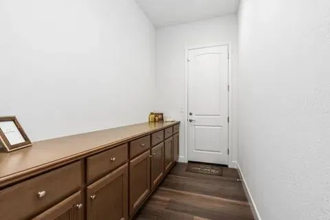 a view of a hallway with closet