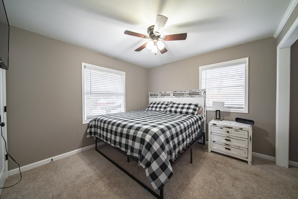 6315 Rockefeller Drive Columbus, GA 31909 - Photo 13 of 24 a bedroom with a bed and window