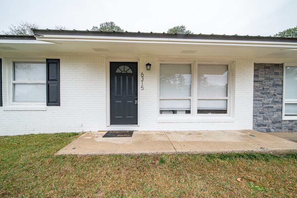 6315 Rockefeller Drive Columbus, GA 31909 - Photo 2 of 24 a front view of a house with a yard