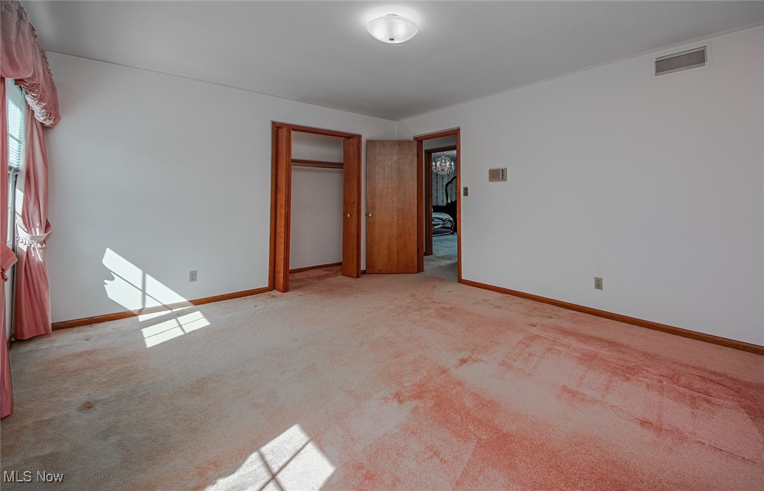 3375 Bancroft Road Akron, OH 44333 - Photo 26 of 45 ery spacious bedroom with hardwood floors underneath carpet.