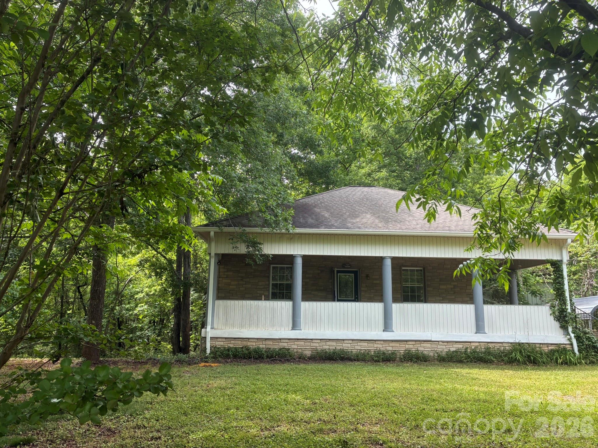 2051 Sutton Spring Road York, SC 29745 - Photo 3 of 47 a view of a house with a large window