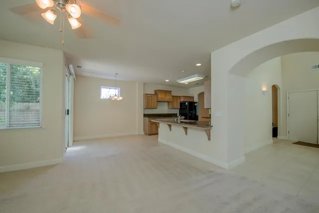 a view of kitchen with furniture and window