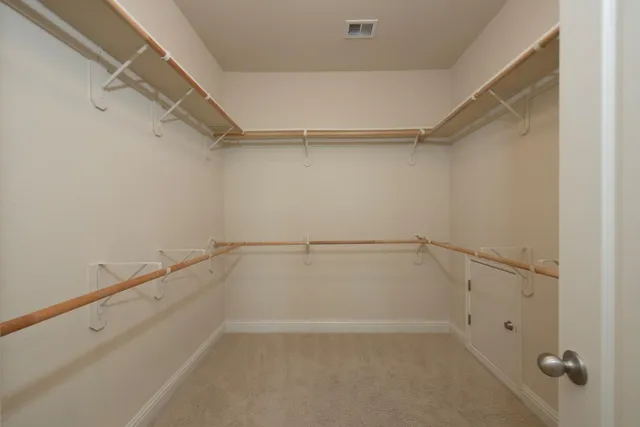 a bathroom with a double vanity sink and a bathtub