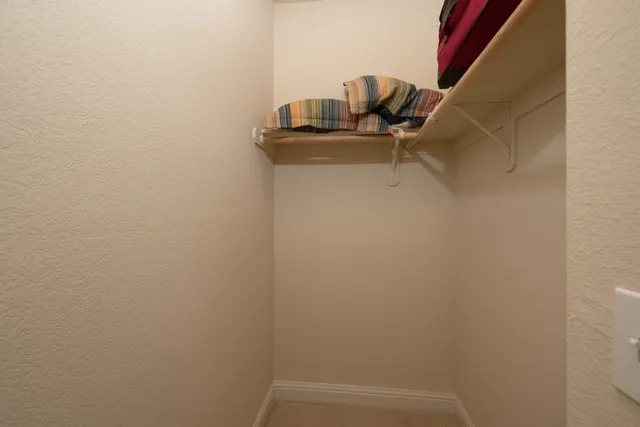a bathroom with a sink and vanity