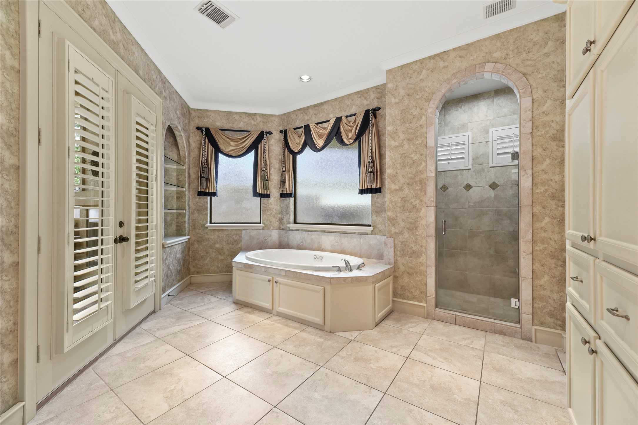 16610 Champagne Falls Court Spring, TX 77379 - Photo 19 of 45 a bathroom with a sink a toilet and shower