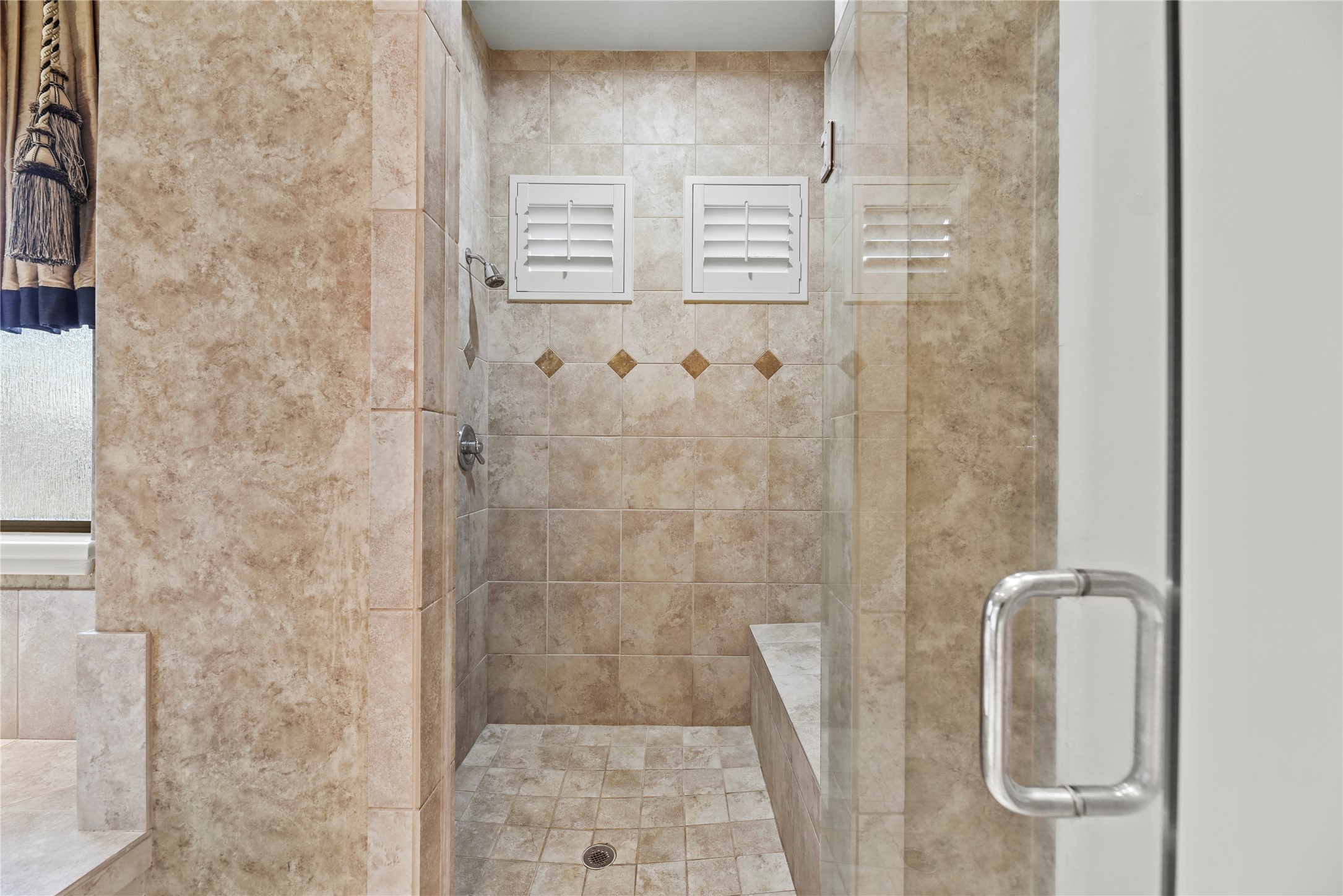 16610 Champagne Falls Court Spring, TX 77379 - Photo 20 of 45 a bathroom with a shower