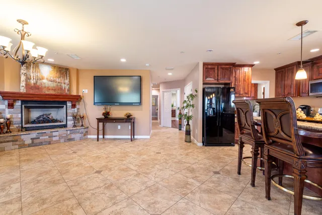 a view of a livingroom with furniture and a flat screen tv