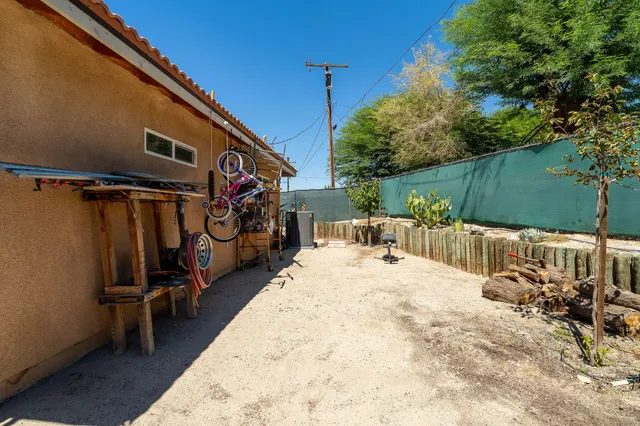 a view of swimming pool with a patio