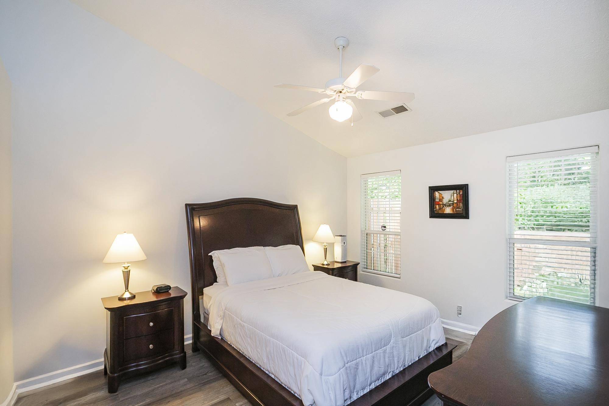 3911 Dodson Chapel Road, Unit 32 Hermitage, TN 37076 - Photo 12 of 25 a bedroom with a bed and a lamp next to a window