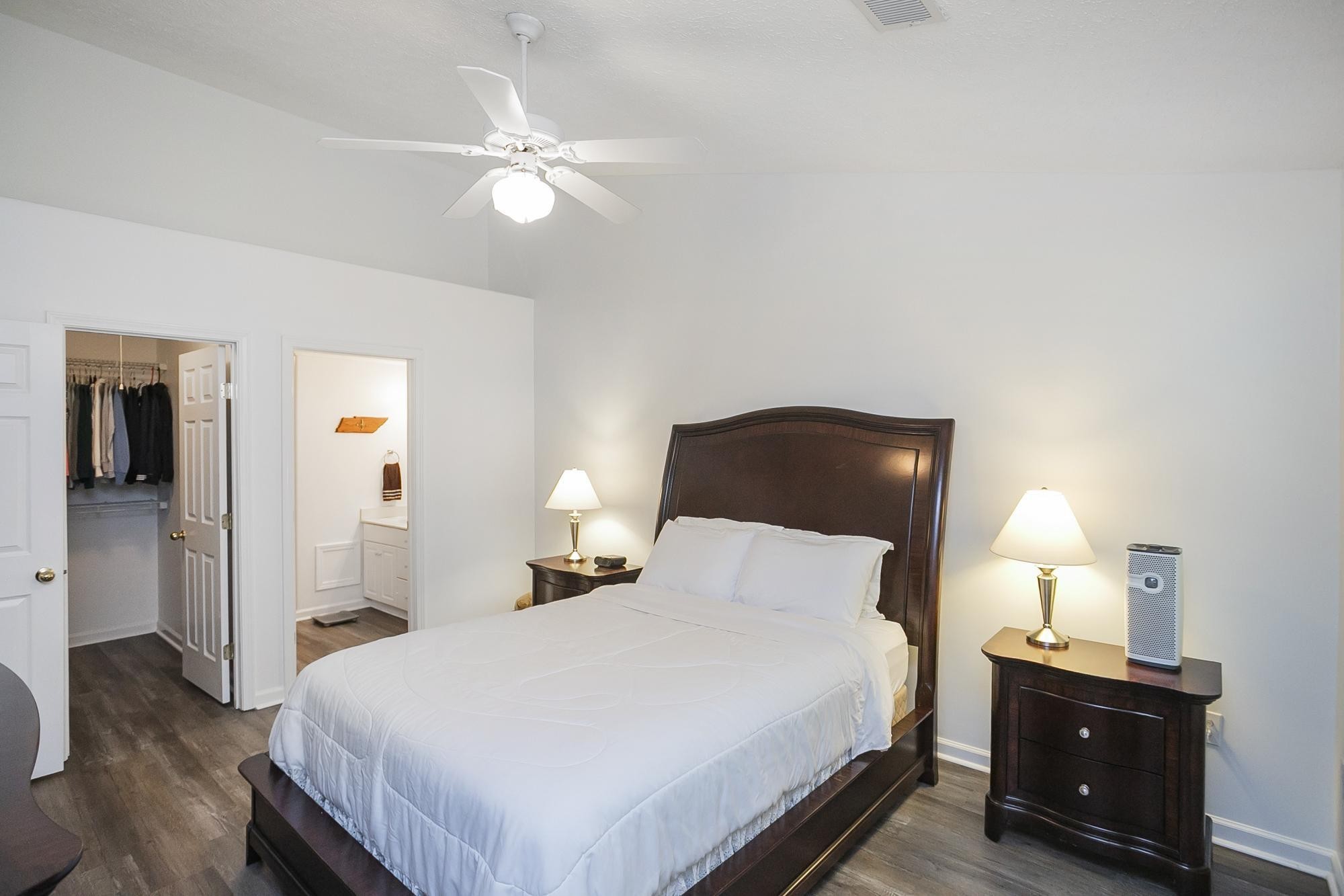 3911 Dodson Chapel Road, Unit 32 Hermitage, TN 37076 - Photo 13 of 25 a bedroom with a bed and a lamp