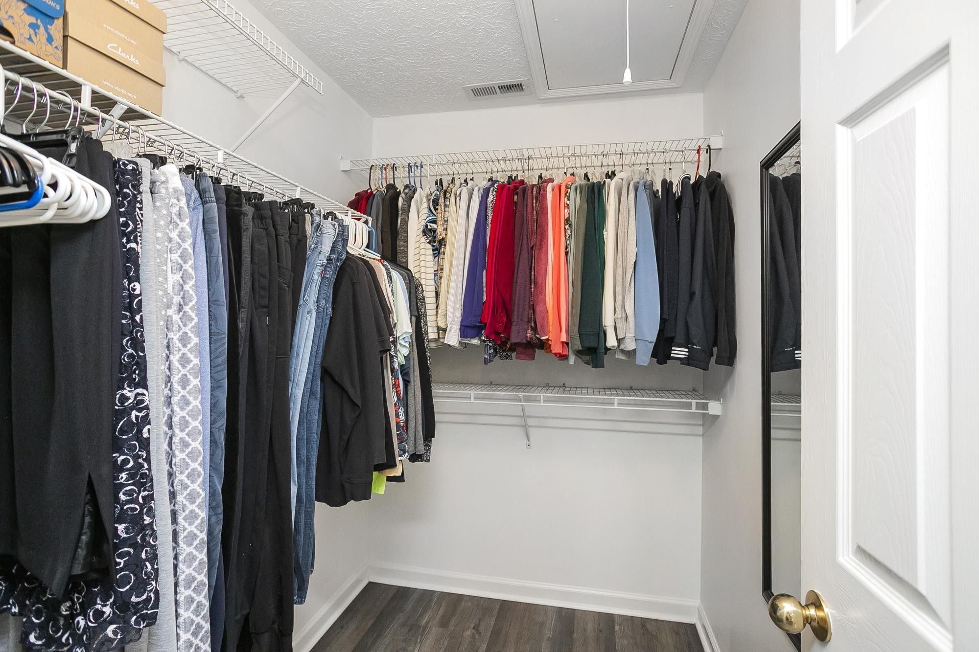 3911 Dodson Chapel Road, Unit 32 Hermitage, TN 37076 - Photo 14 of 25 a view of walk in closet with clothes