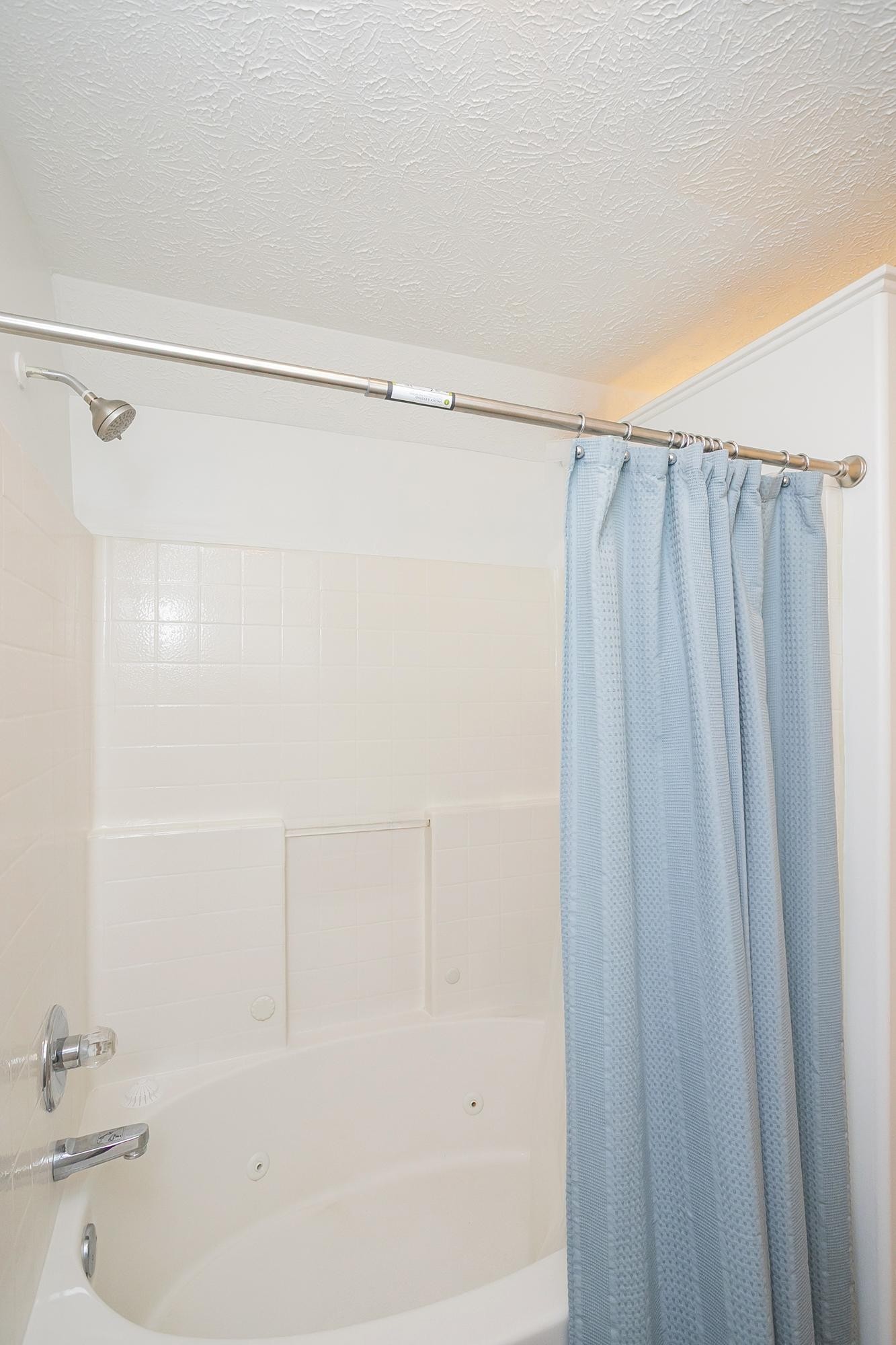 3911 Dodson Chapel Road, Unit 32 Hermitage, TN 37076 - Photo 16 of 25 a bathroom with a shower and a sink