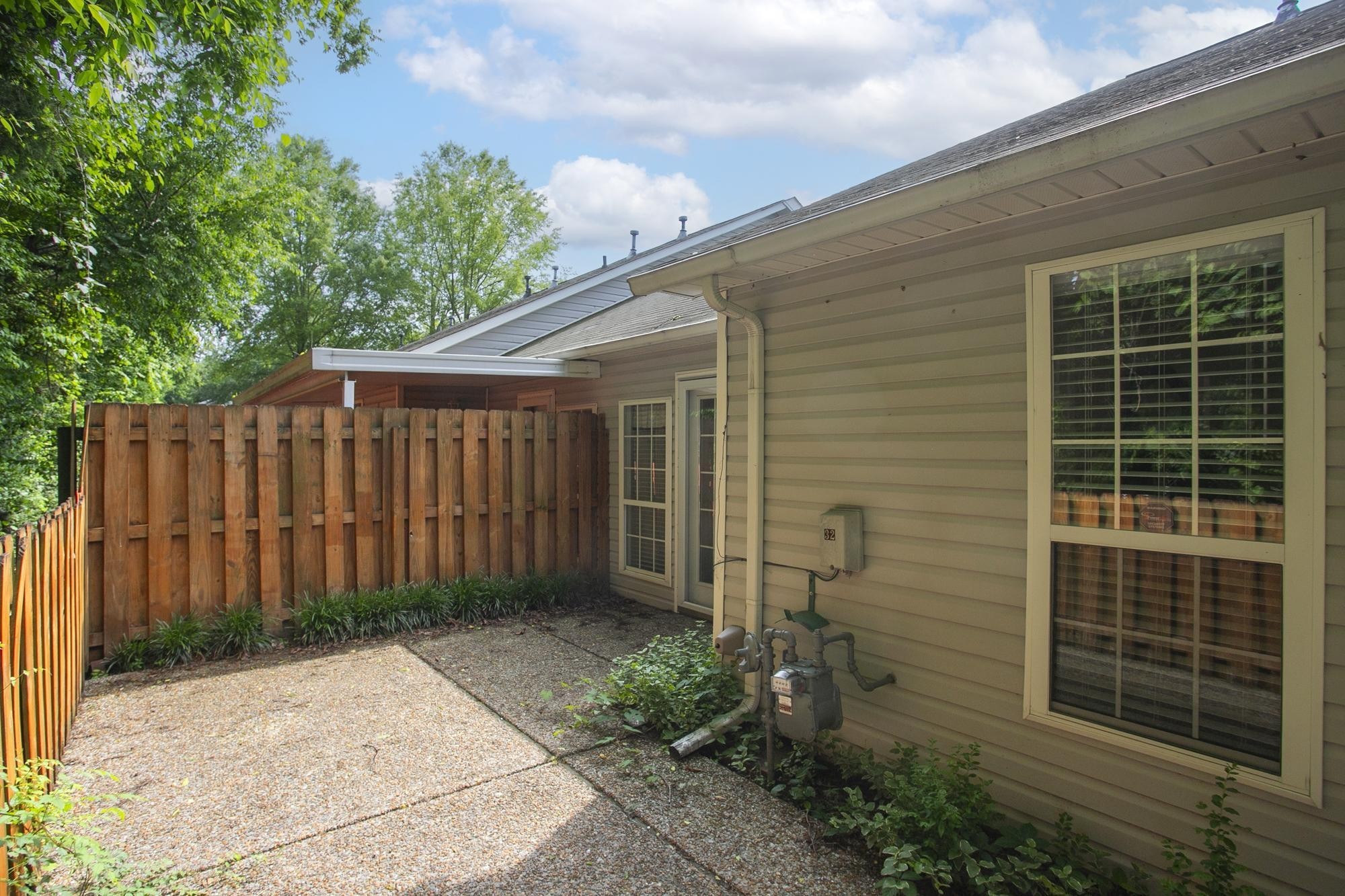 3911 Dodson Chapel Road, Unit 32 Hermitage, TN 37076 - Photo 19 of 25 a view of a house with a backyard