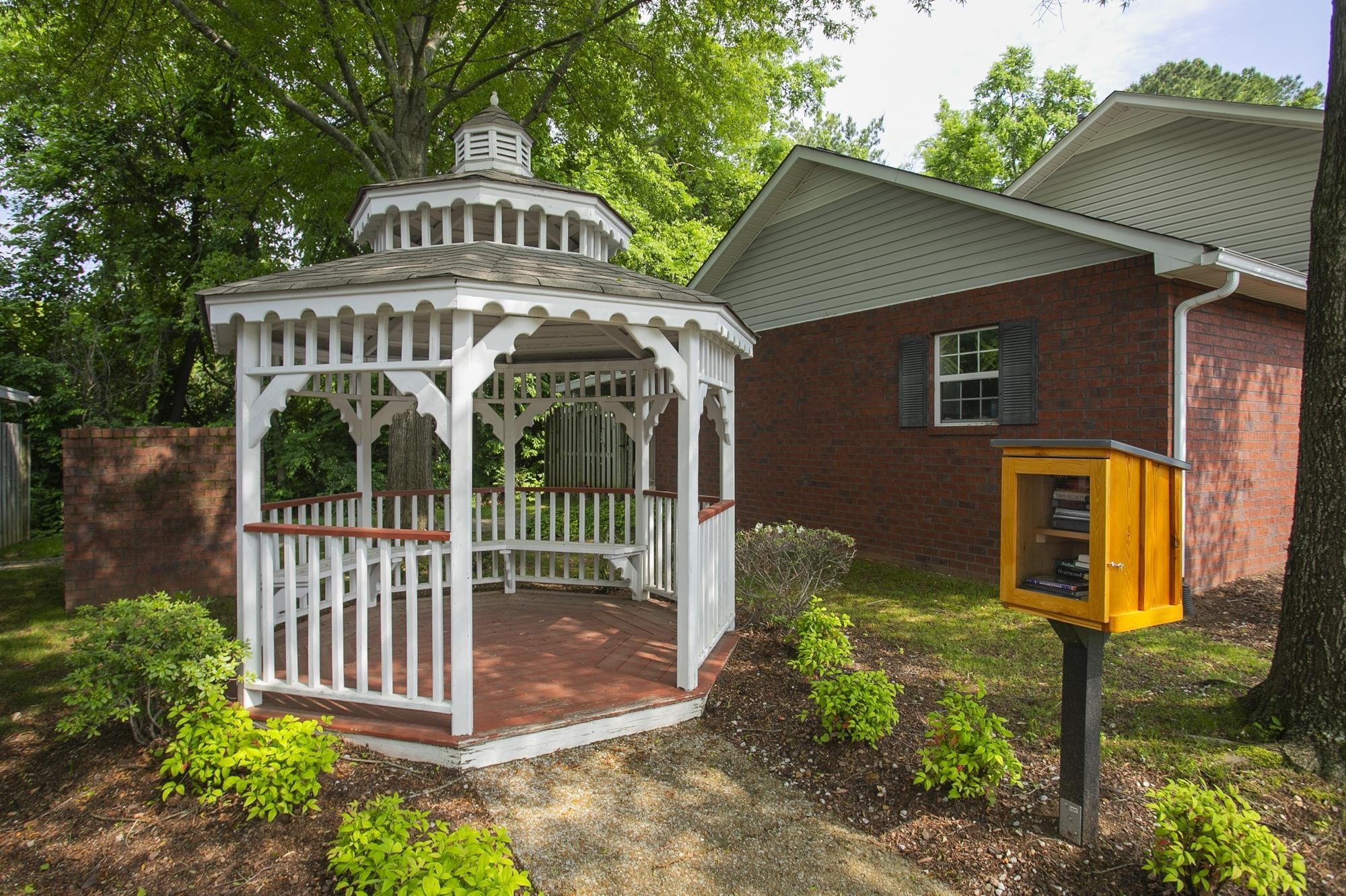 3911 Dodson Chapel Road, Unit 32 Hermitage, TN 37076 - Photo 24 of 25 a front view of a house with garden