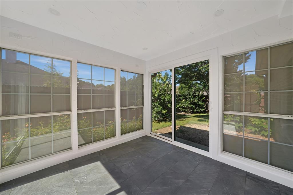 2909 Normandy Court Euless, TX 76039 - Photo 19 of 36 a view of empty room with floor to ceiling window and floor to ceiling window