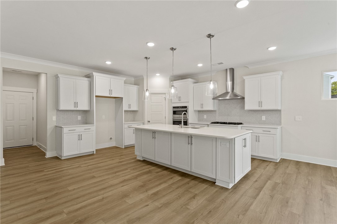 315 Old Shirley Road Central, SC 29630 - Photo 13 of 26 This kitchen showcases a central island and contemporary amenities, ideal for daily living and entertaining.