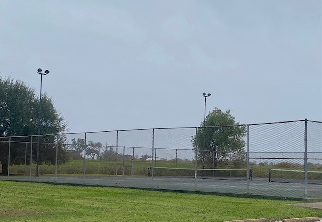 218 Cattle Drive Trail Angleton, TX 77515 - Photo 7 of 34 Tennis courts are one of the many amenities located within the community.