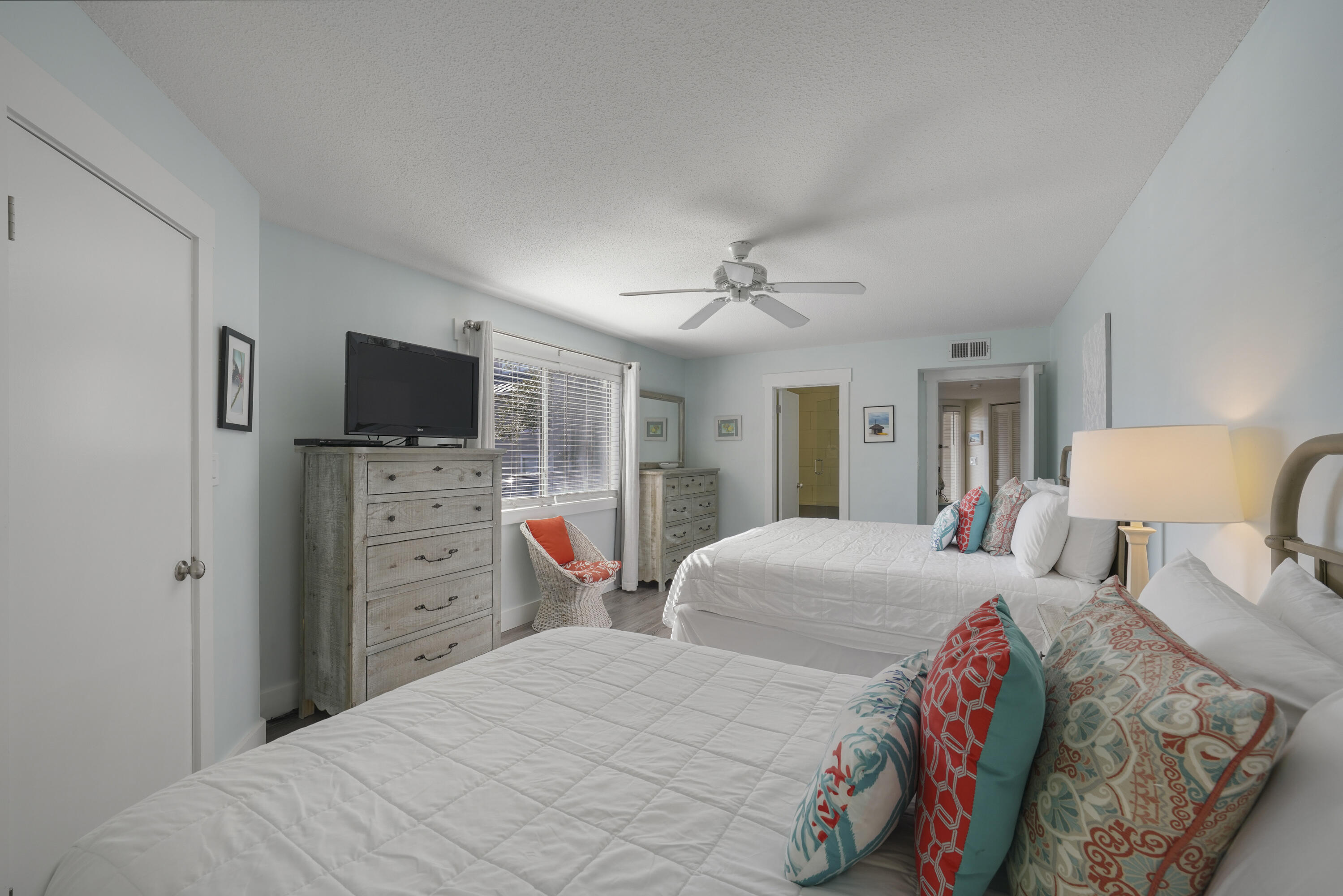 9815 Highway 98, Unit 200 Miramar Beach, FL 32550 - Photo 15 of 54 a bedroom with a bed and a flat screen tv