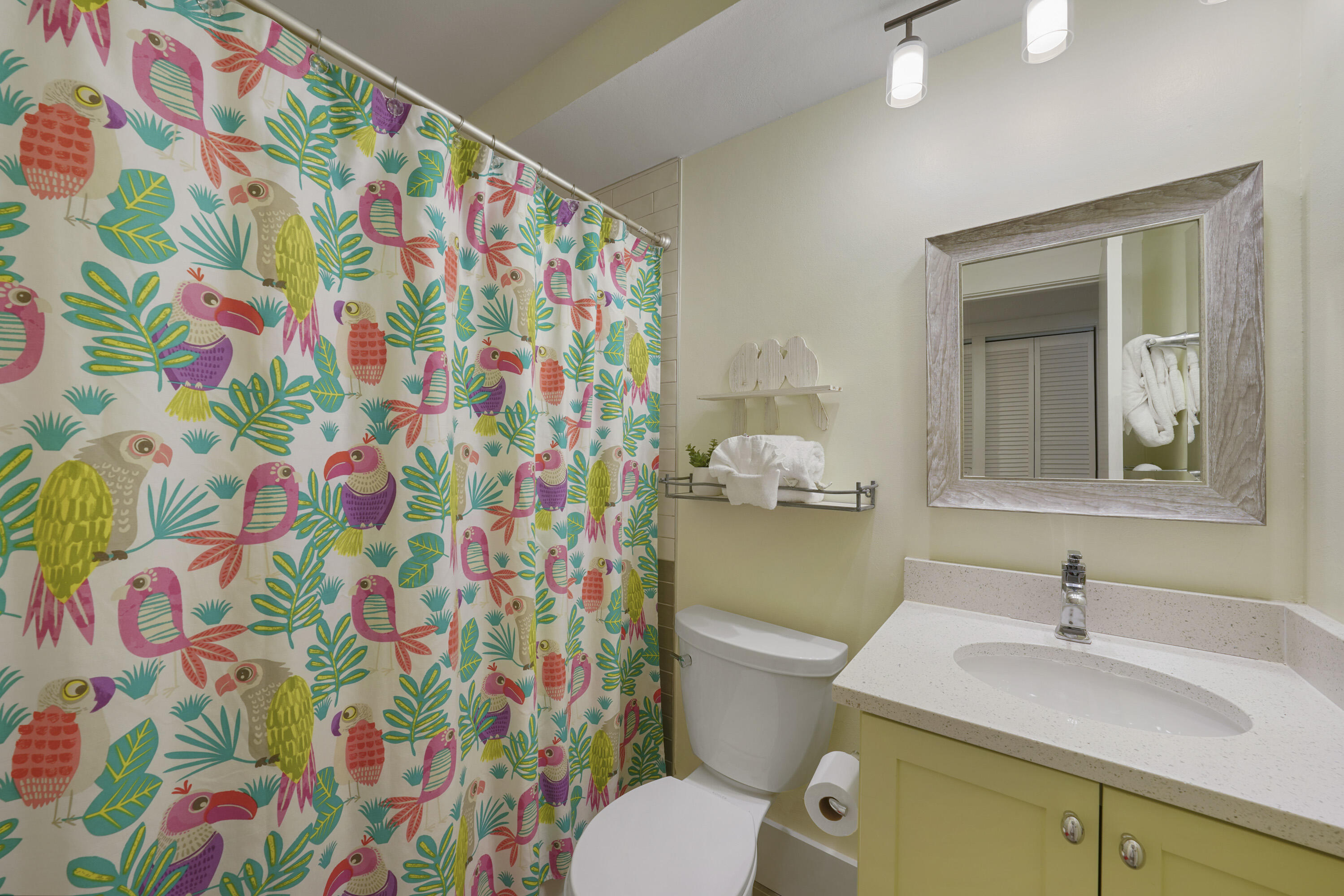 9815 Highway 98, Unit 200 Miramar Beach, FL 32550 - Photo 21 of 54 a bathroom with a sink toilet and mirror