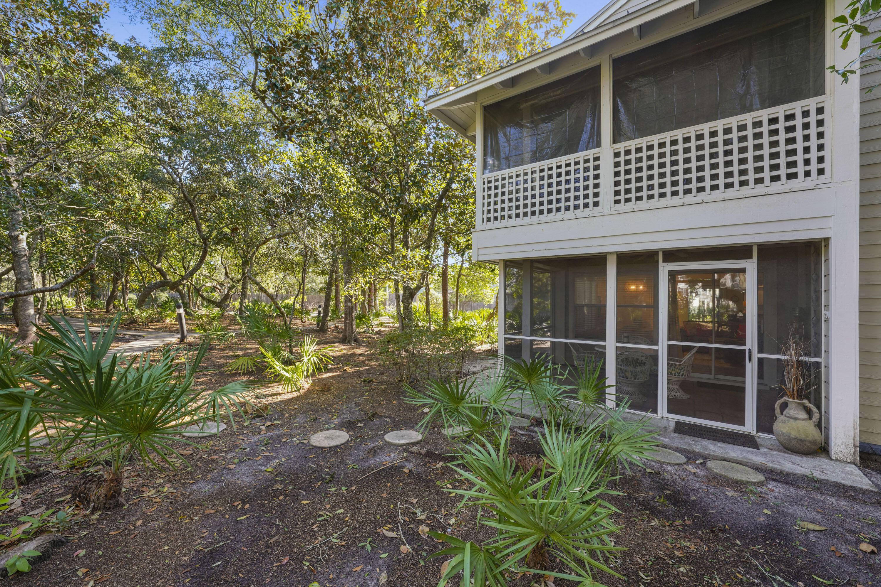 9815 Highway 98, Unit 200 Miramar Beach, FL 32550 - Photo 26 of 54 a house view with a backyard space
