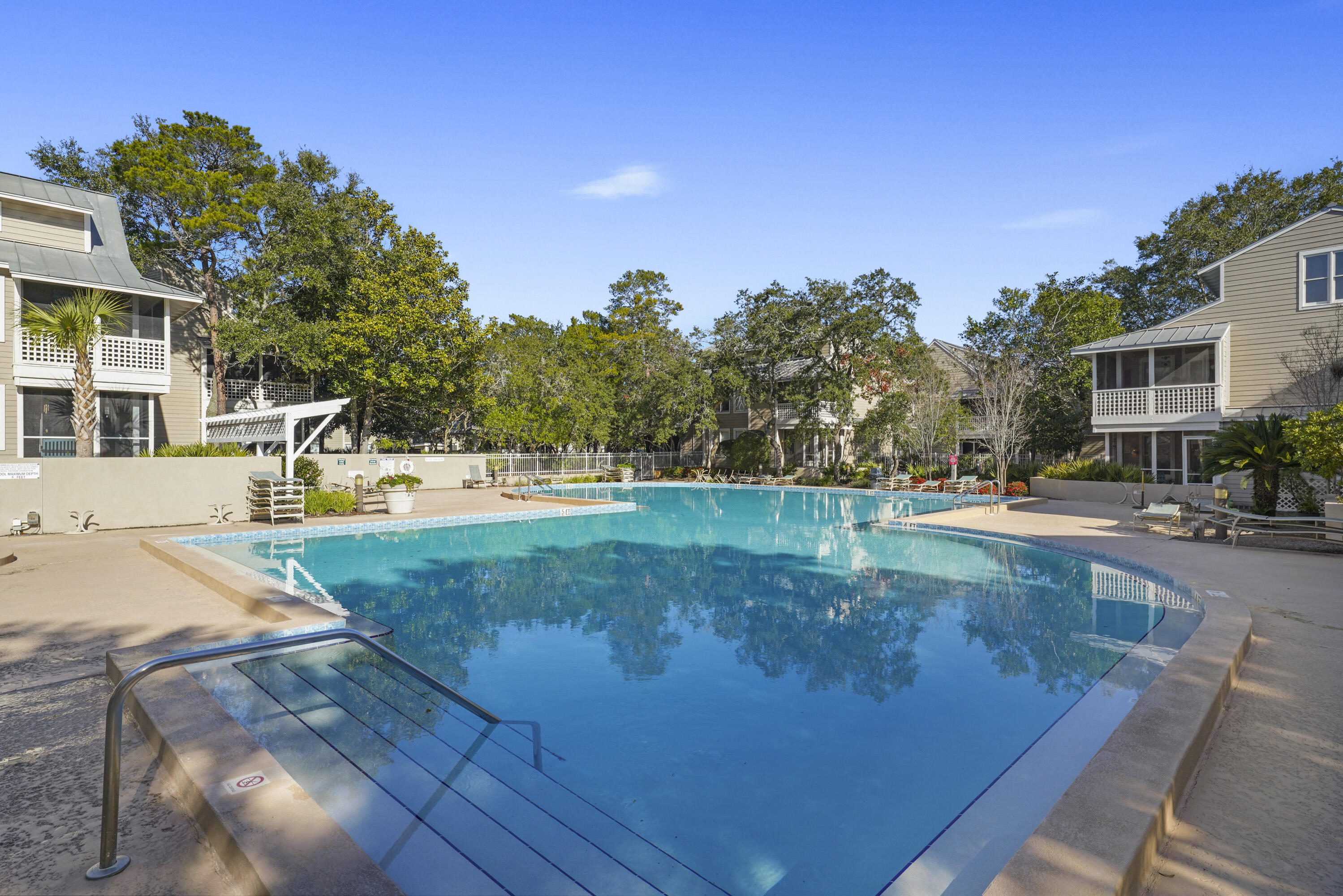9815 Highway 98, Unit 200 Miramar Beach, FL 32550 - Photo 28 of 54 a view of a swimming pool with a yard