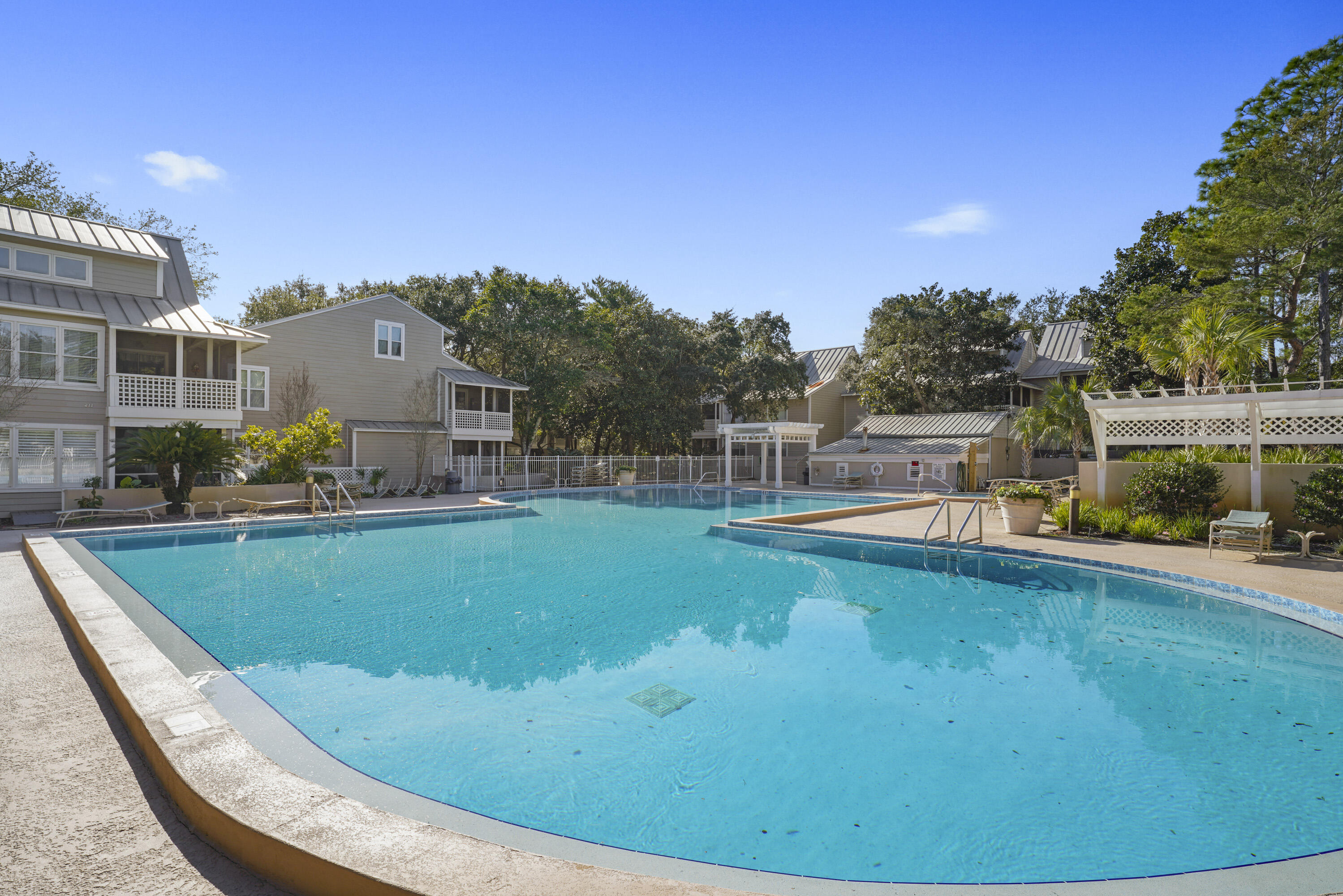 9815 Highway 98, Unit 200 Miramar Beach, FL 32550 - Photo 29 of 54 a view of a swimming pool with a yard