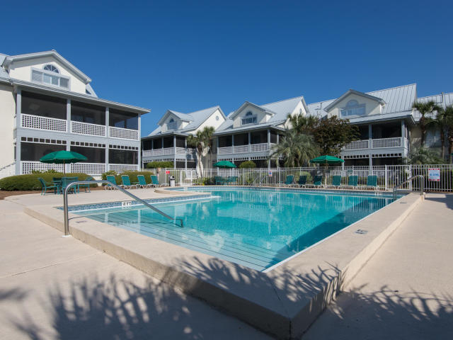 9815 Highway 98, Unit 200 Miramar Beach, FL 32550 - Photo 38 of 54 a view of a house with a swimming pool