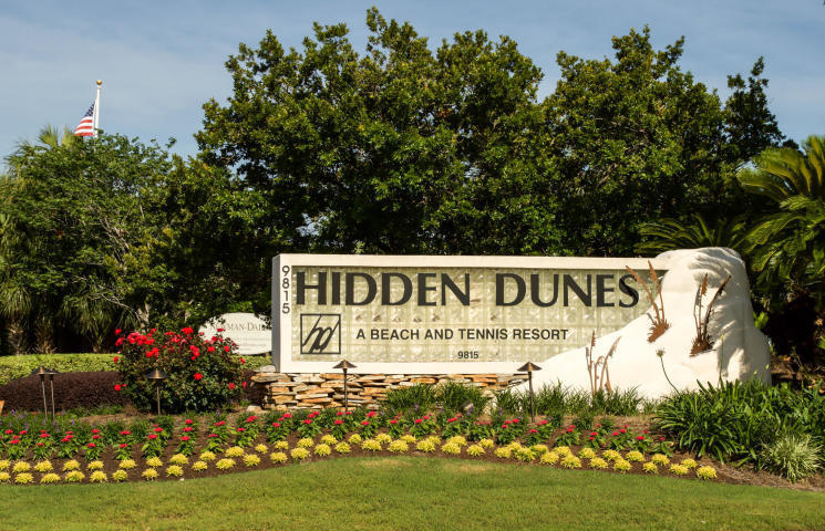 9815 Highway 98, Unit 200 Miramar Beach, FL 32550 - Photo 43 of 54 a sign on the side of a road