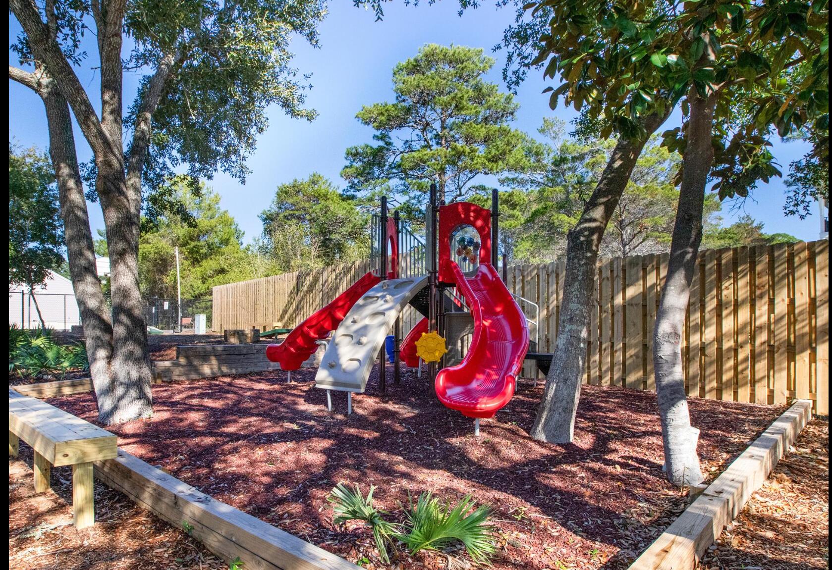 9815 Highway 98, Unit 200 Miramar Beach, FL 32550 - Photo 48 of 54 a view of outdoor space with garden