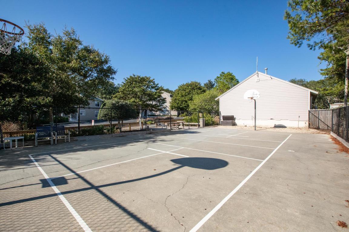 9815 Highway 98, Unit 200 Miramar Beach, FL 32550 - Photo 52 of 54 a view of outdoor space and tennis court