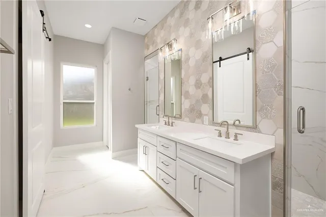 a spacious bathroom with a double vanity sink mirror and double