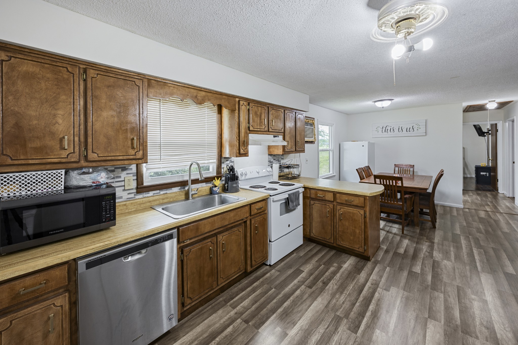 421 Shady Grove Road Flintville, TN 37335 - Photo 20 of 33 a kitchen with sink cabinets and window