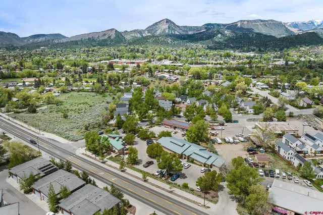 a view of a city with mountain